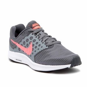 Pink and grey Nike shoes